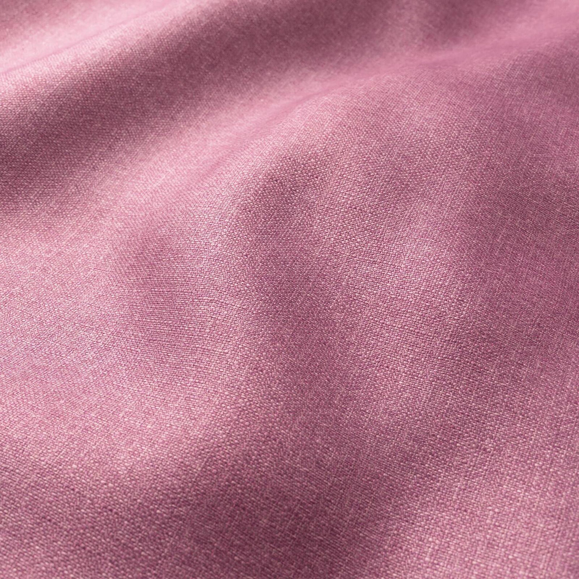 Dusty pink fabric close-up with fine weave, soft drape and matte finish; ideal for garments.