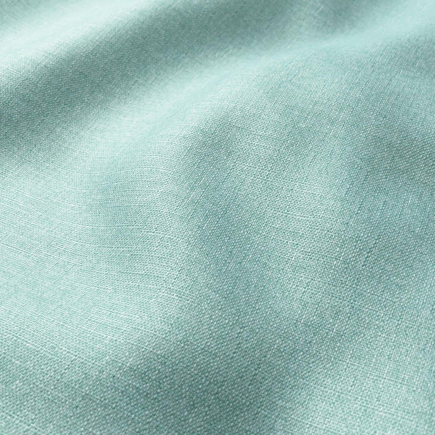 Sea green linen-look fabric close-up with soft drape and fine woven texture.