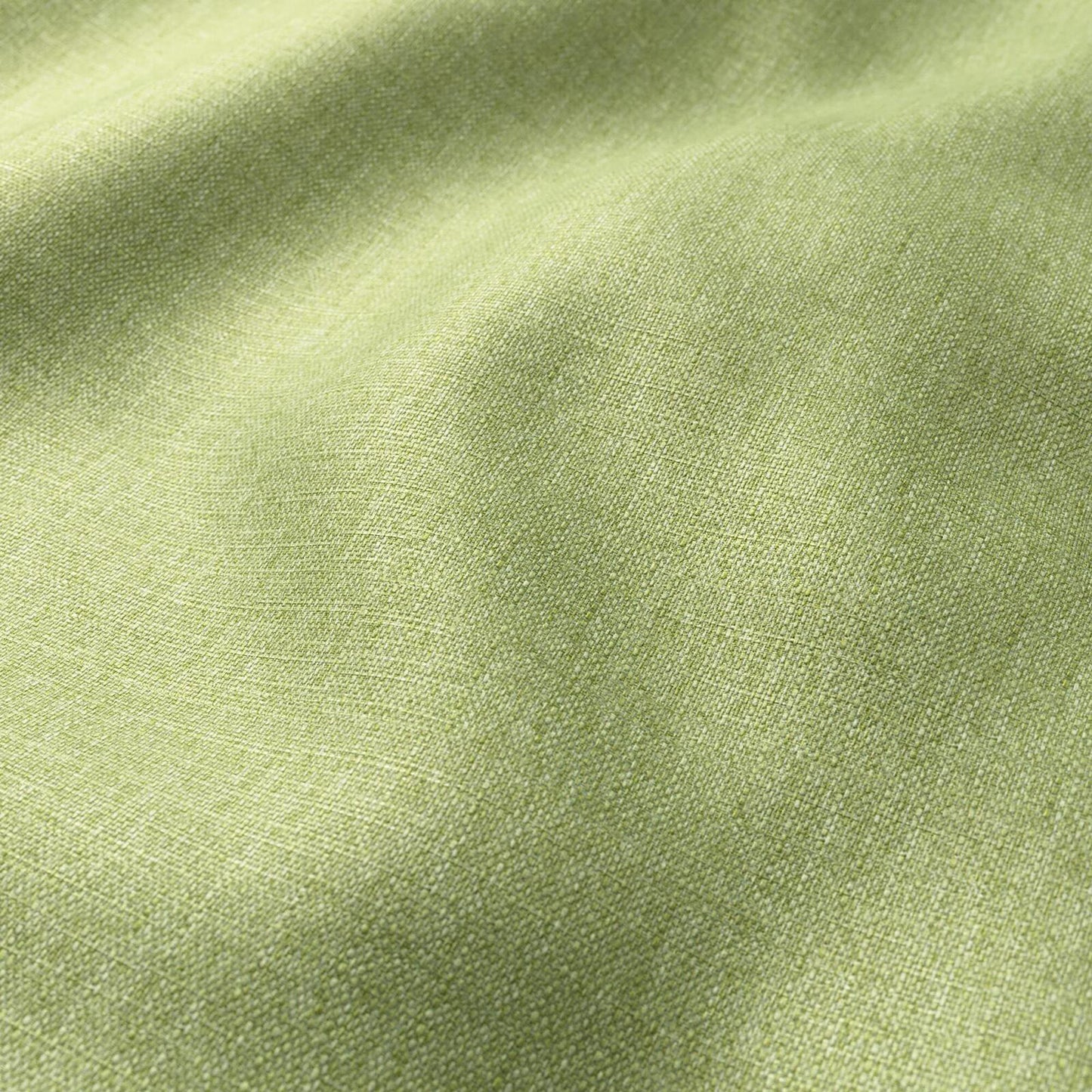 Lime-green linen-like fabric close-up with soft drape and textured weave.