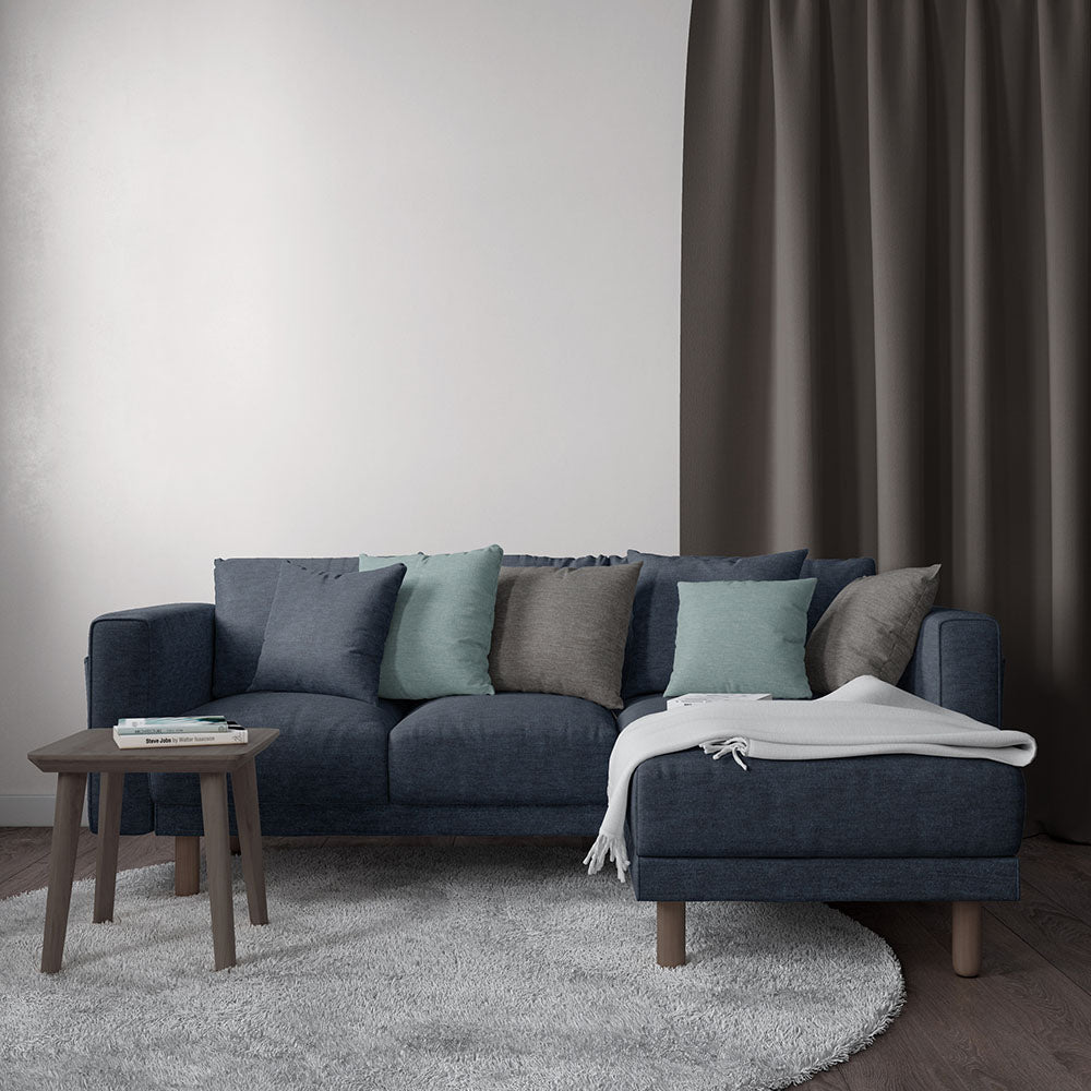 Navy solid upholstery fabric swatch with visible weave.
