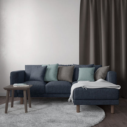 Navy solid upholstery fabric swatch with visible weave.