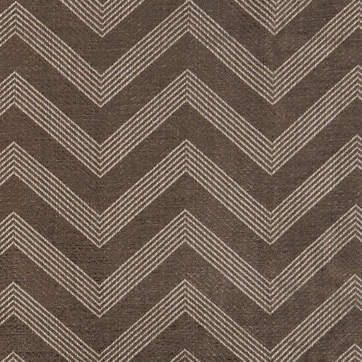 Brown chevron-patterned fabric with beige striped zigzags and textured weave.