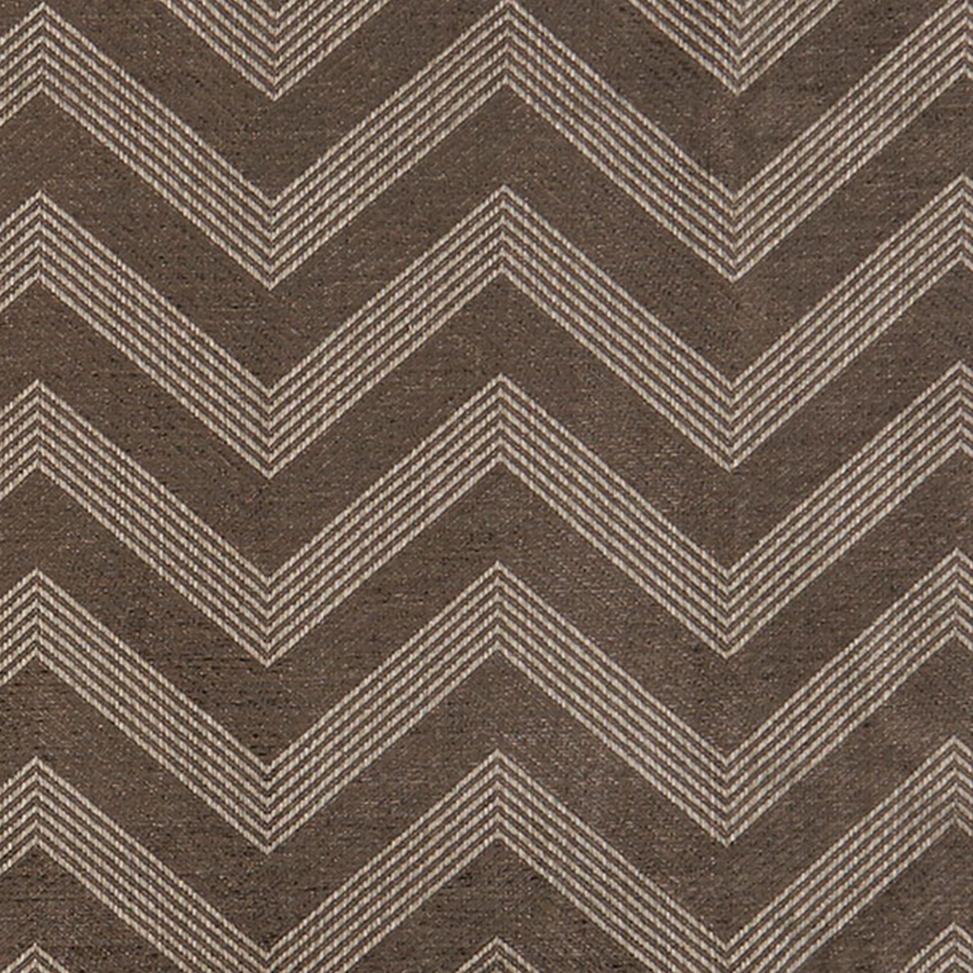 Brown chevron-patterned fabric with beige striped zigzags and textured weave.