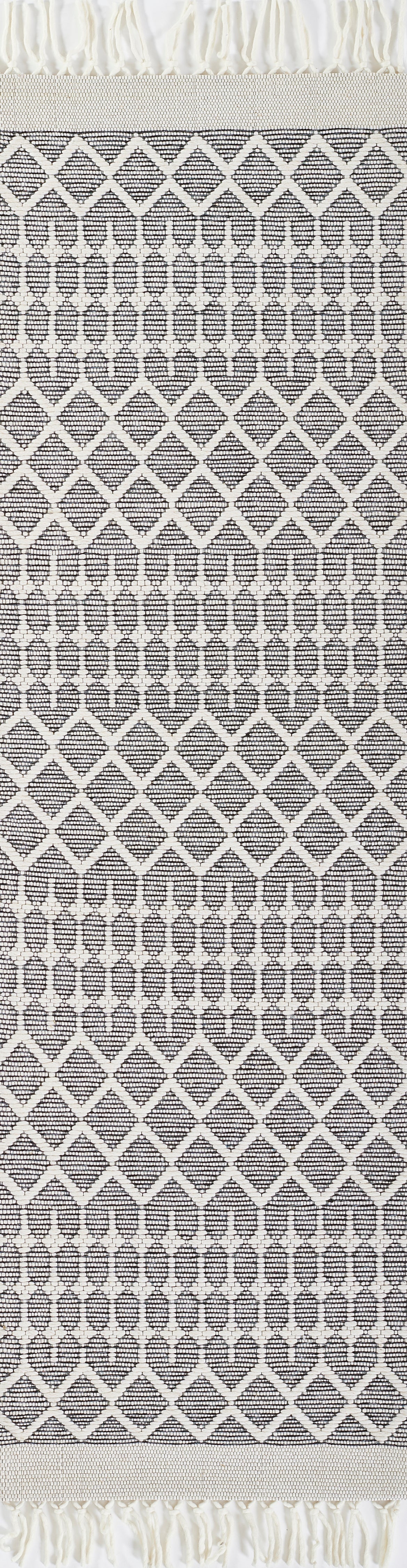 Gray geometric rug with a white diamond lattice pattern and fringe on both ends.