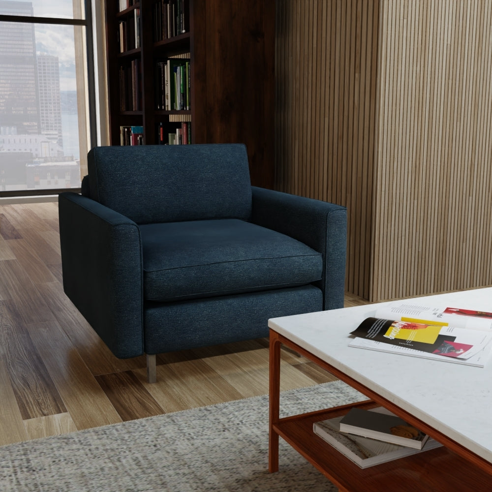 Blue solid upholstery fabric (NJ25-941) shown in a modern living room setting.