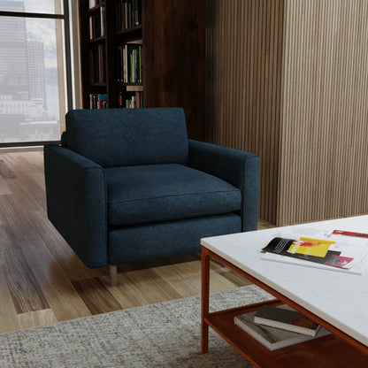 Blue solid upholstery fabric (NJ25-941) shown in a modern living room setting.
