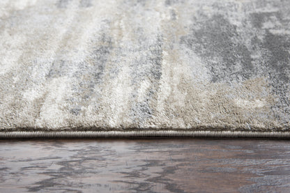 8' x 10' contemporary area rug with a geometric pattern in neutral tones.