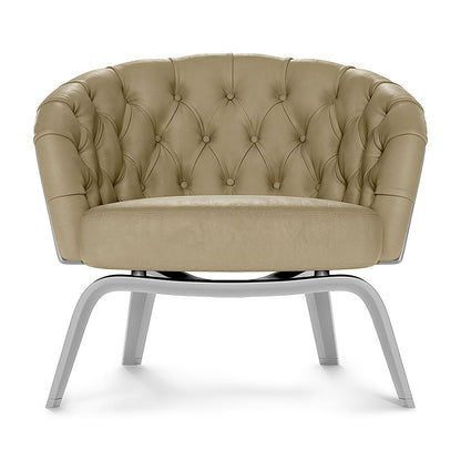 Beige tufted patent fabric club chair with circular back, button detailing, and sleek silver metal legs.