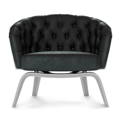 Blue solid fabric lounge chair with tufted back, buttoned detailing, rounded arms, and curved metal legs; Chesterfield-style.
