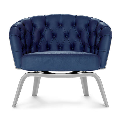 Blue solid fabric barrel accent chair with button-tufted back and gray metal curved legs.