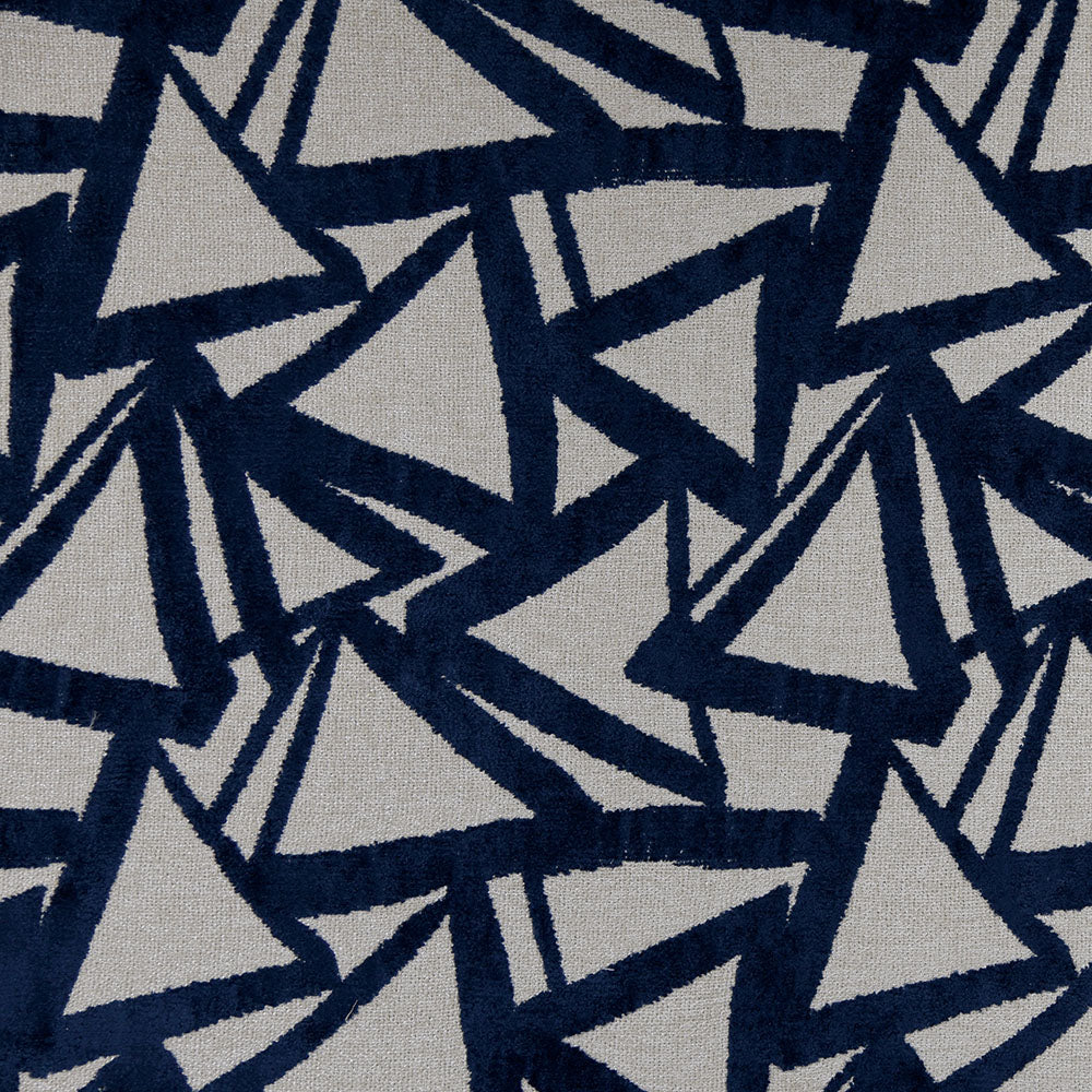 Navy geometric fabric with angular triangle pattern; modern abstract textile.