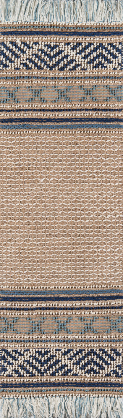 Beige woven kilim-style rug with navy geometric bands, blue accents and fringe.