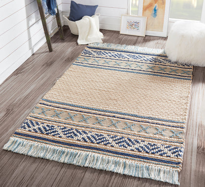 Rectangular flatweave rug in blue, navy and beige with geometric border and fringed ends.