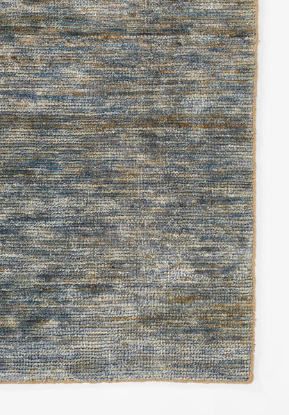 Blue-gray woven area rug with beige specks; textured flat-weave, rectangular, casual contemporary decor.