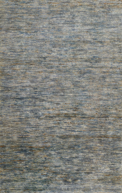 Blue-gray mottled woven rug with subtle beige flecks, modern textured look.