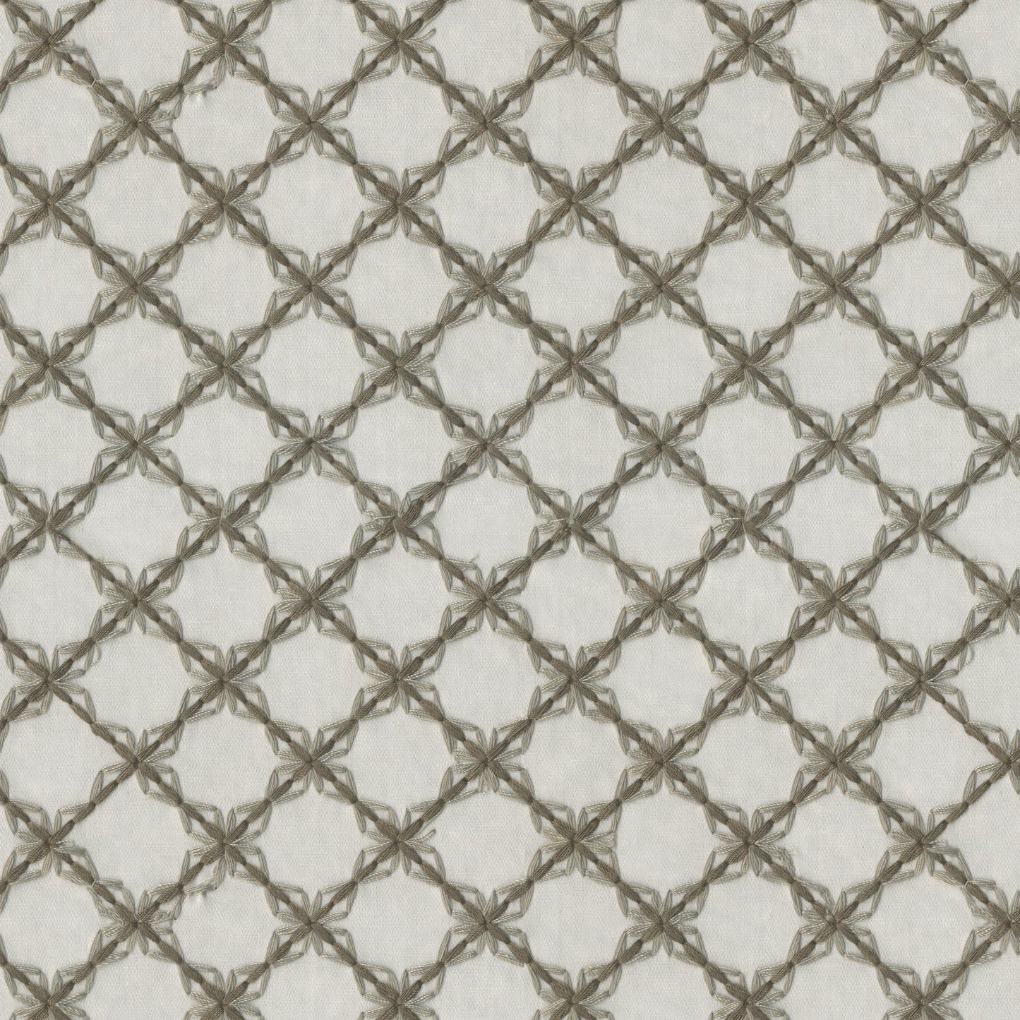 Brown embroidery forms a diamond lattice pattern on pale beige fabric; traditional embroidery style.