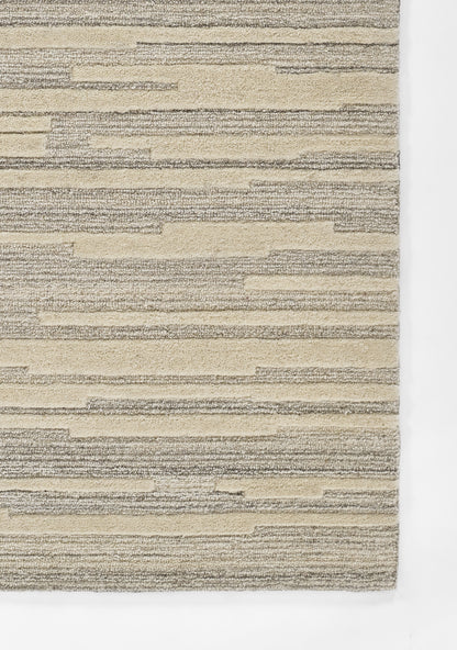 Hand-tufted 8x10 grey wool area rug with modern graphic pattern, neutral indoor rug for living room, bedroom, or dining room décor.