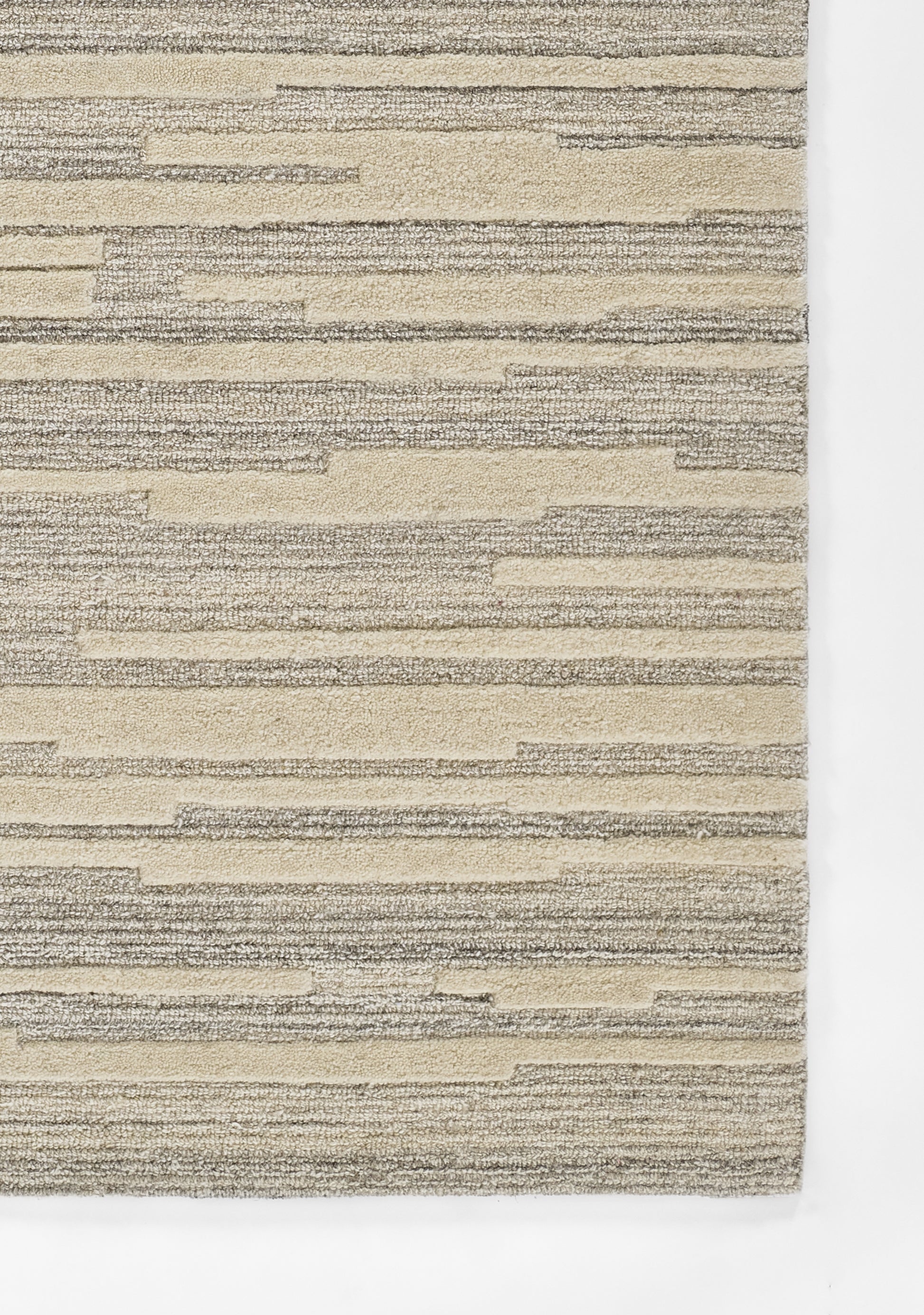 Rectangular beige and gray striped rug with subtle textured horizontal lines for modern home decor.