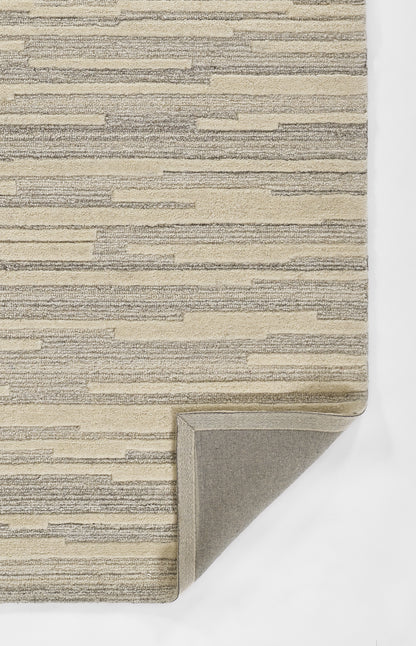 Hand-tufted 8x10 grey wool area rug with modern graphic pattern, neutral indoor rug for living room, bedroom, or dining room décor.