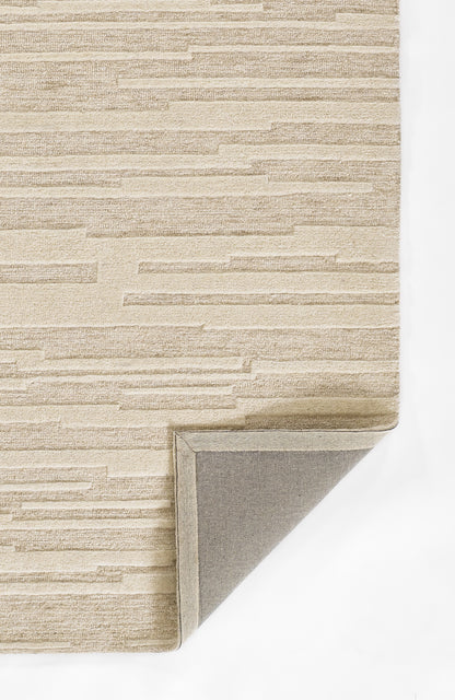 Taupe textured runner rug with a horizontal linear pattern; corner folded to reveal grey backing.