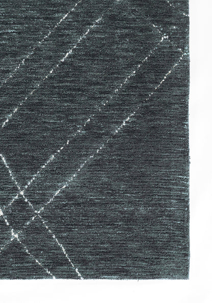 Dark blue textured rug with white diagonal lines creating a subtle geometric pattern.