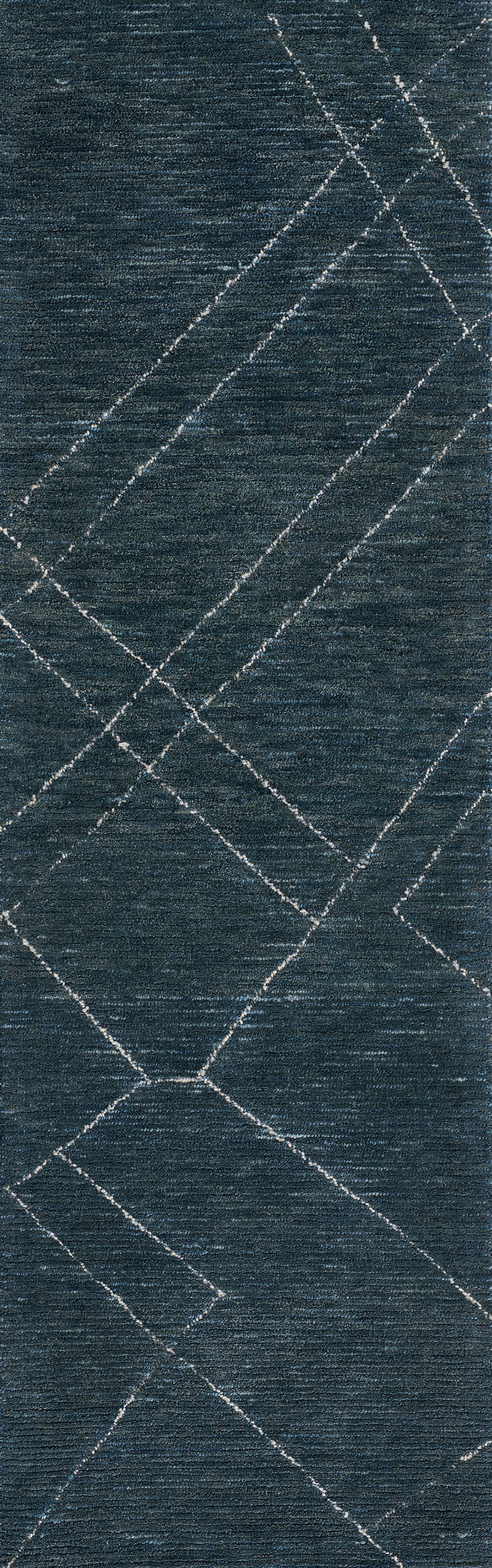 Dark blue woven rug with light gray intersecting lines forming a diamond geometric pattern.