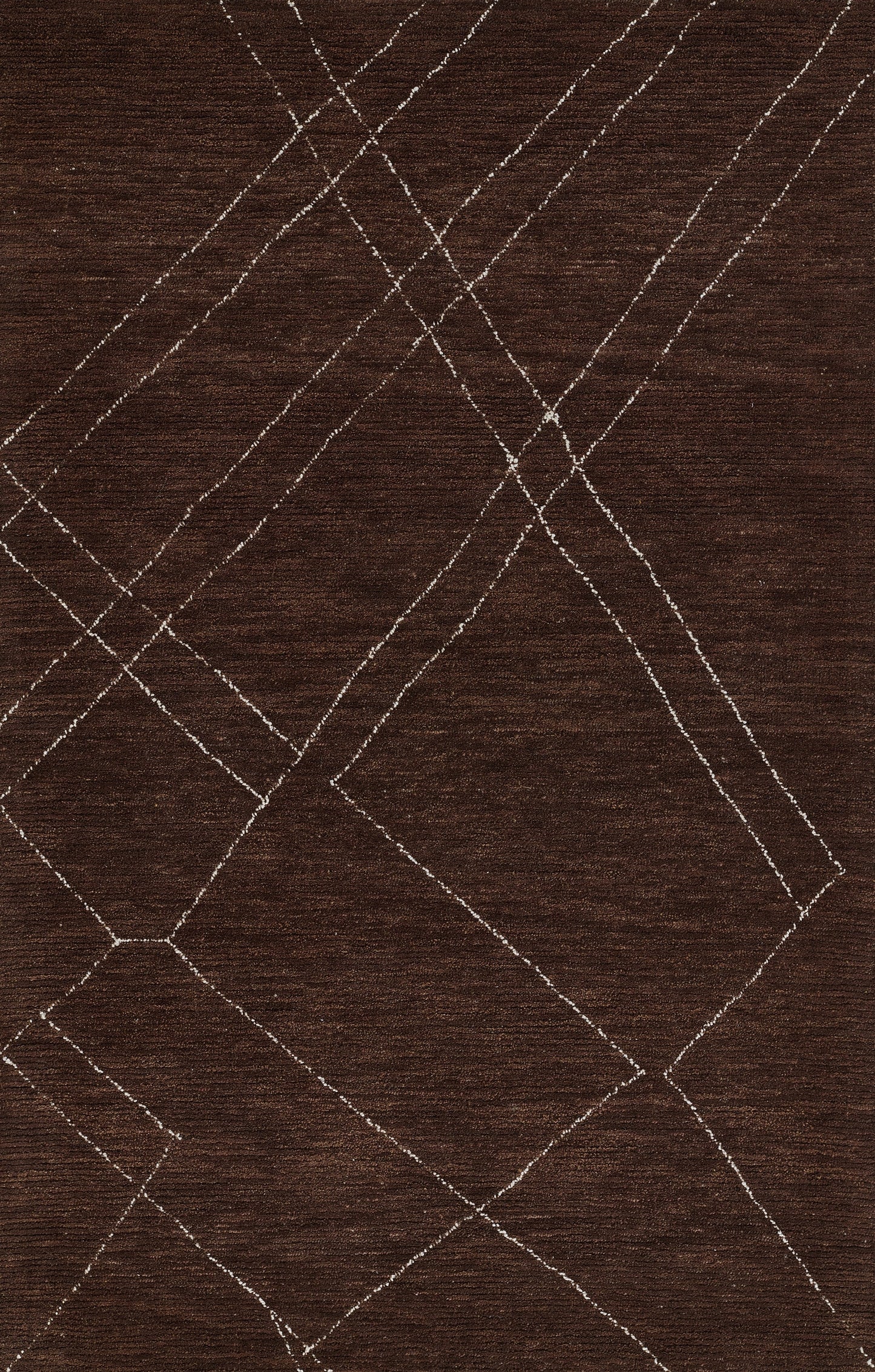 Brown area rug with white intersecting diamond lattice pattern, woven texture, modern geometric style.