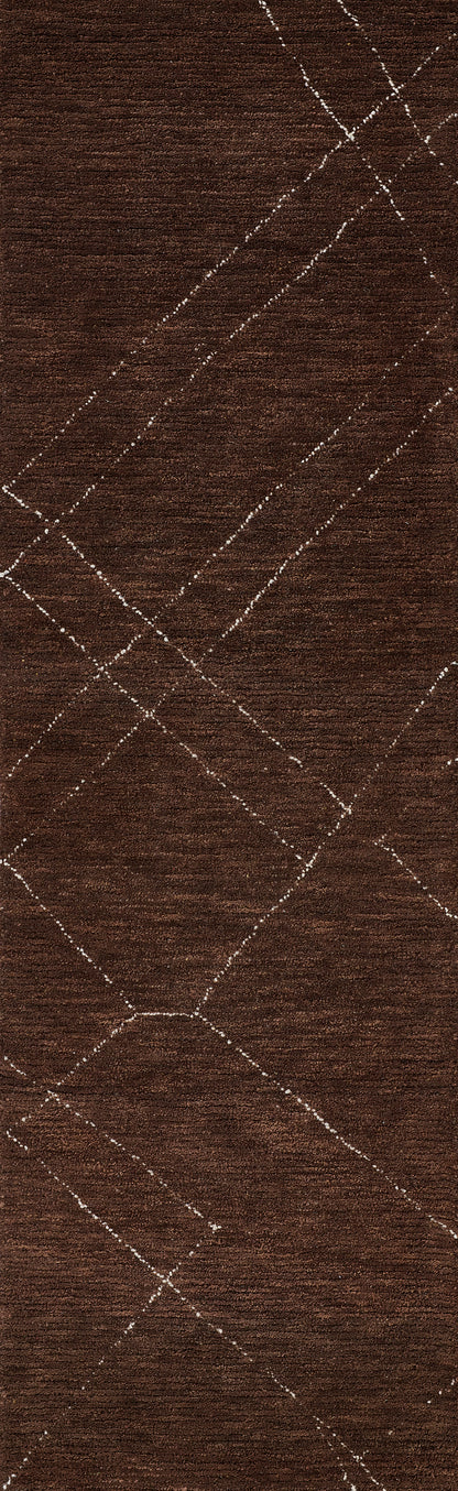 Dark brown textured fabric with white diamond-stitched pattern for upholstery or home décor.
