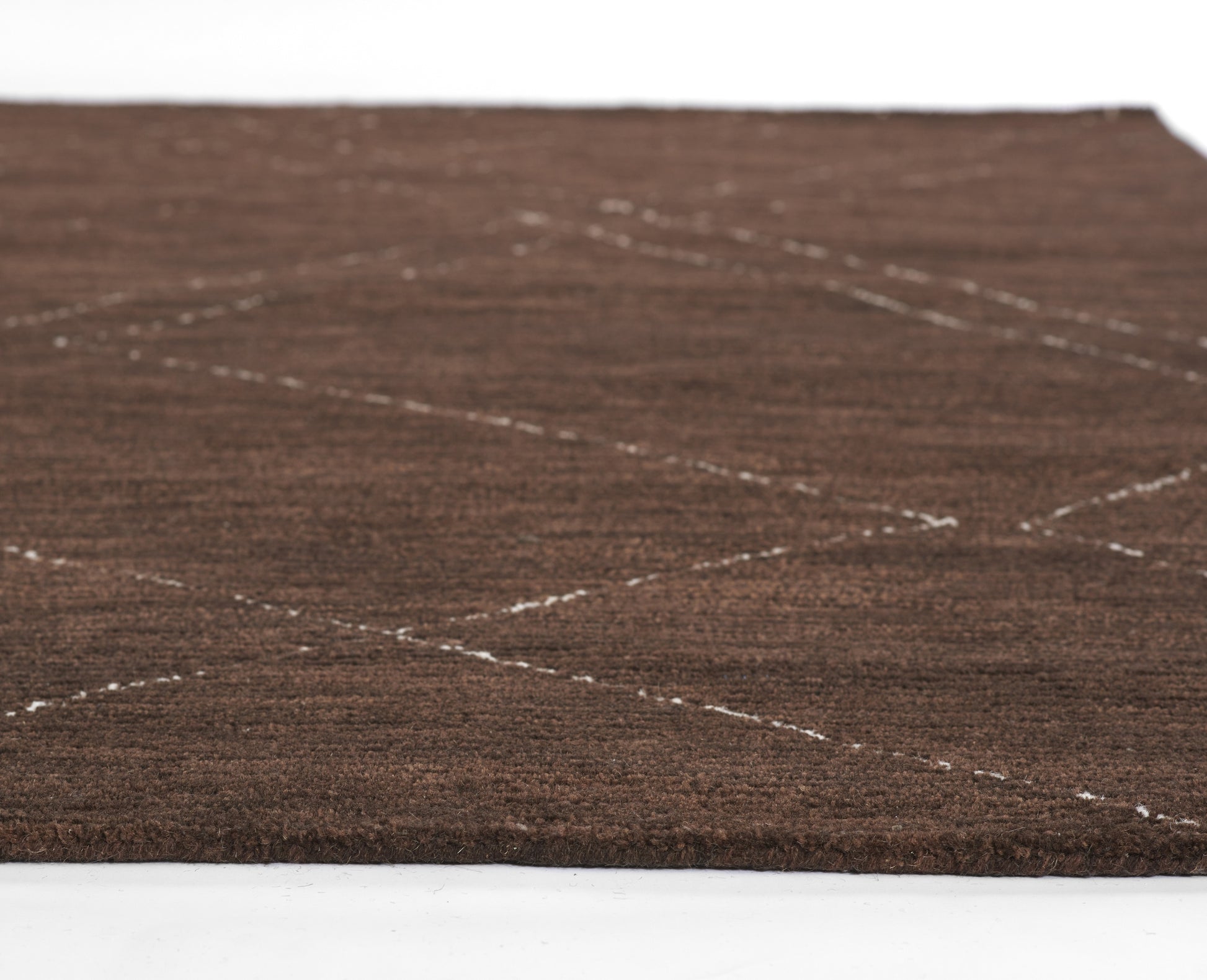 Brown textured area rug with white stitched lines forming a subtle diamond lattice pattern.