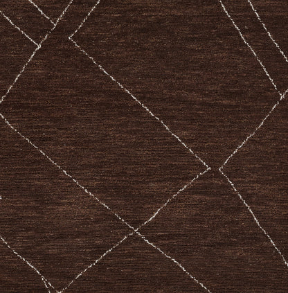 Dark brown textured area rug with a light beige diamond lattice pattern.