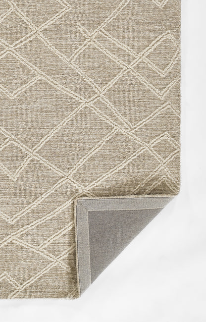 Beige flat-weave rug with white geometric lattice pattern; soft texture, folded corner reveals light gray backing.