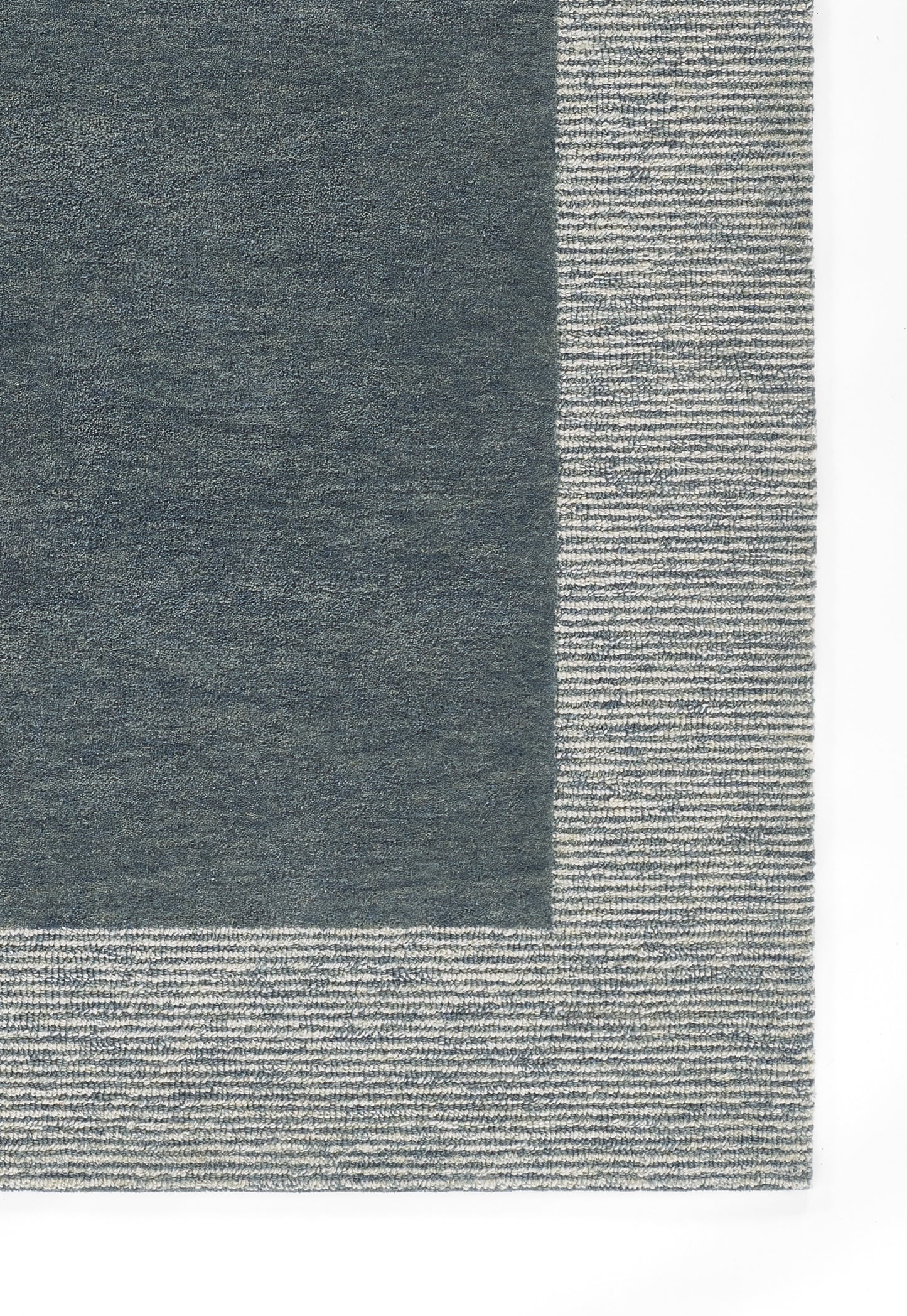 Rectangular navy rug with a dark central panel and a light gray striped border, woven texture.
