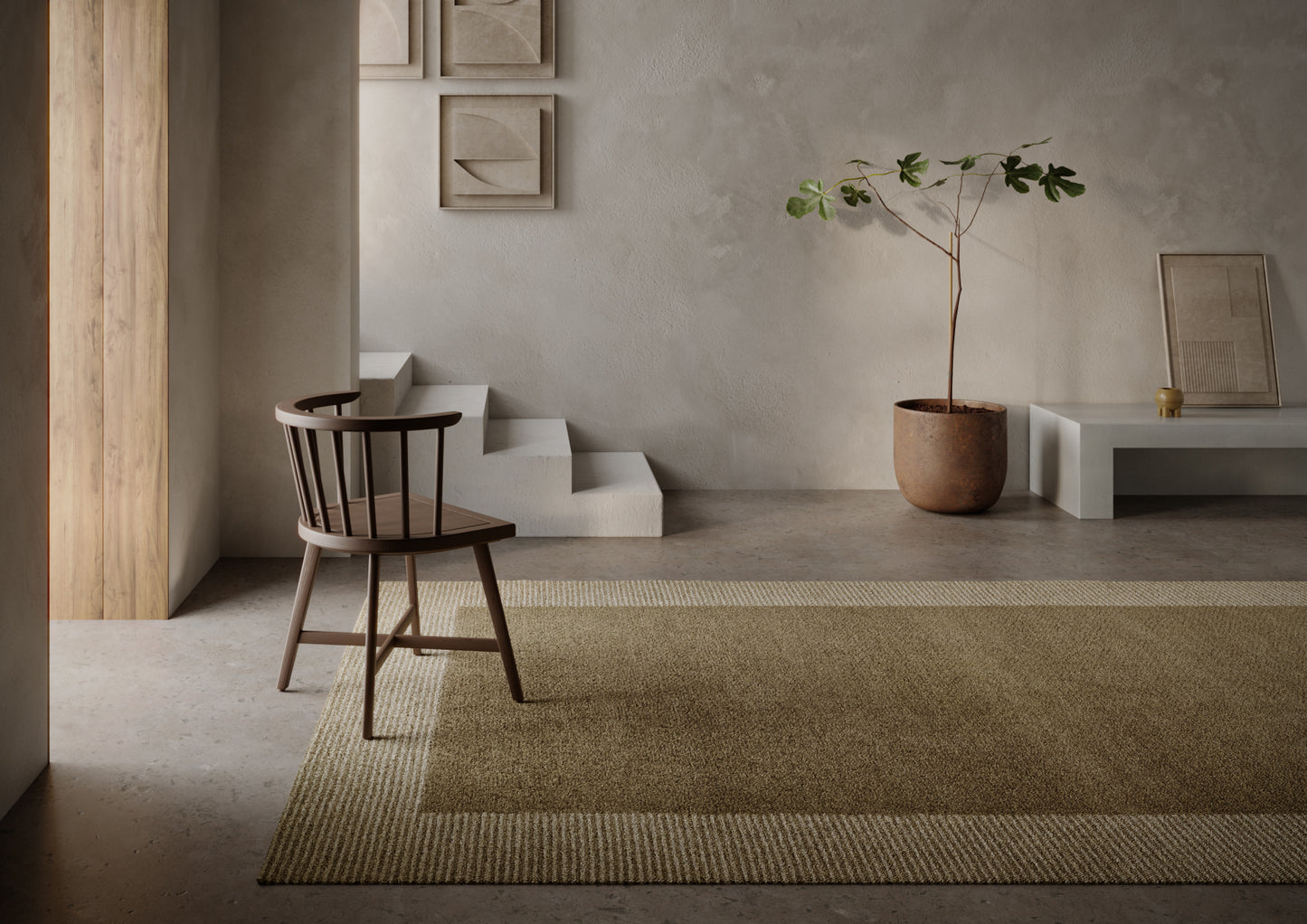 Minimalist taupe living room with a wooden chair, natural jute rug, potted plant, and stepped platform.