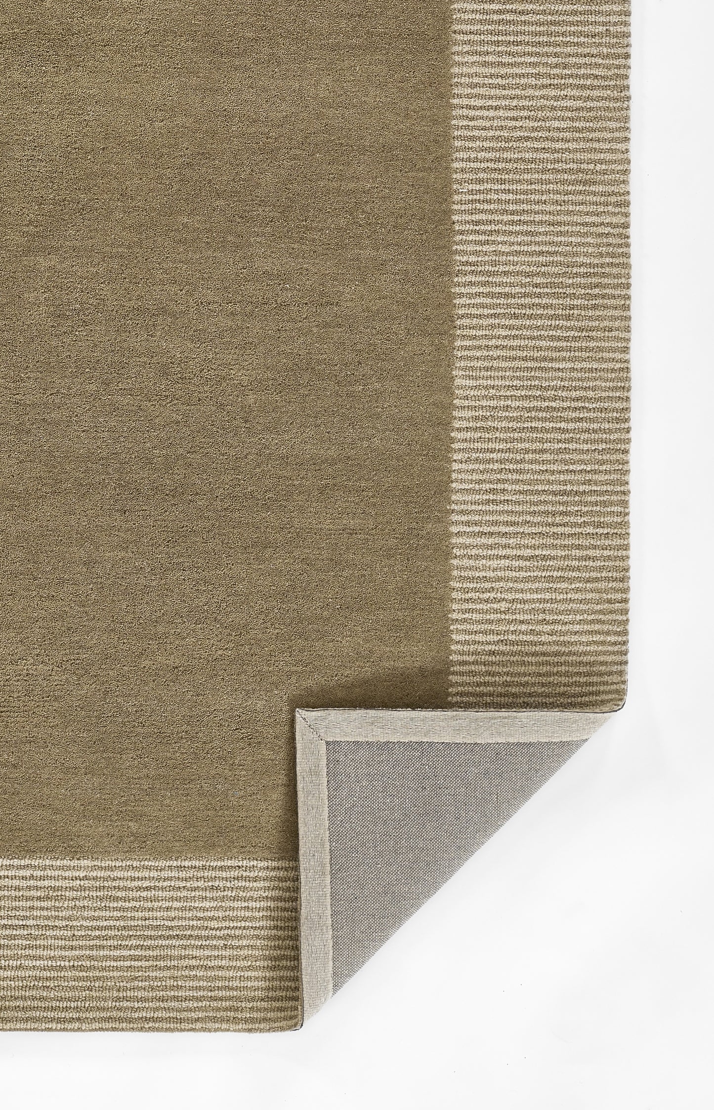 Taupe flatwoven rug with striped border; folded corner reveals grey underside, modern neutral decor