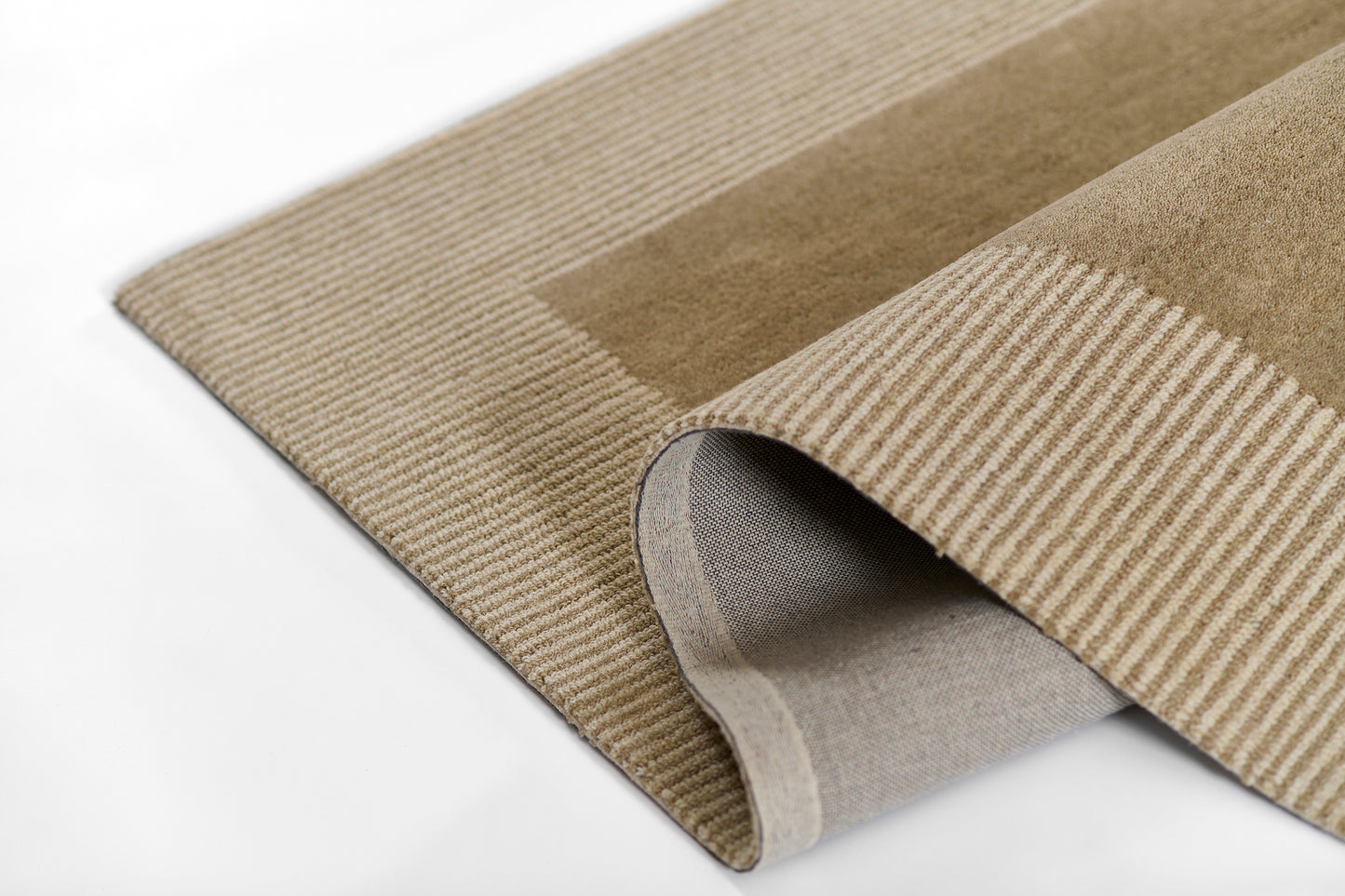 Beige and taupe block-striped woven rug with ribbed texture, rolled edge showing grey underside.