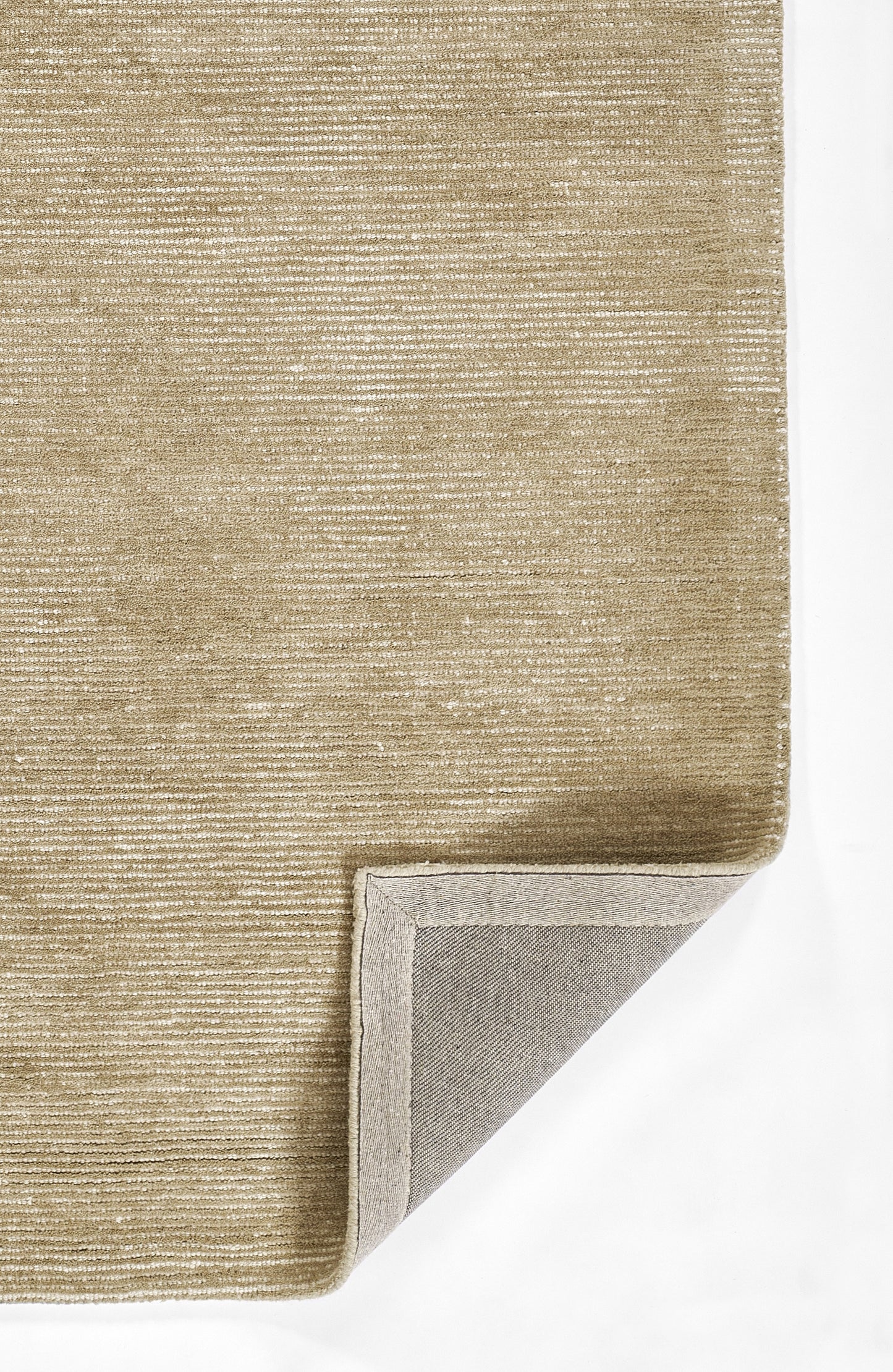 Taupe velvet rug with subtle horizontal stripe texture; folded corner reveals light gray backing.