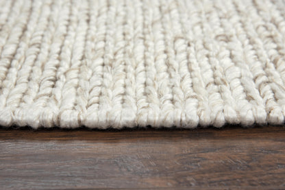 Transitional rug in neutral tones with a subtle pattern, 5' x 8'.
