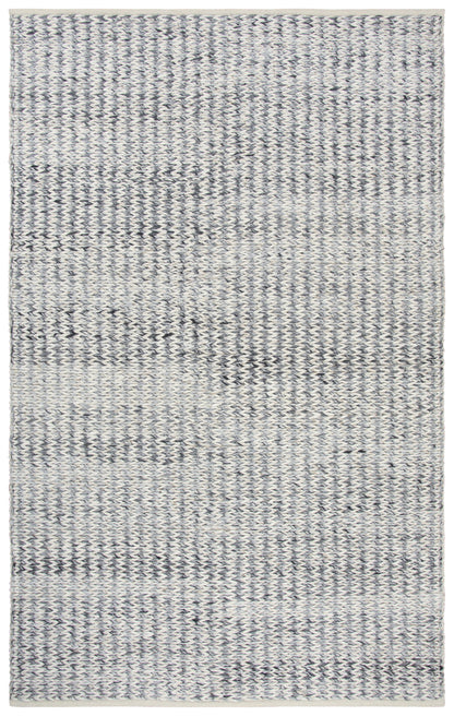Casual 5' x 8' rug with a woven texture.