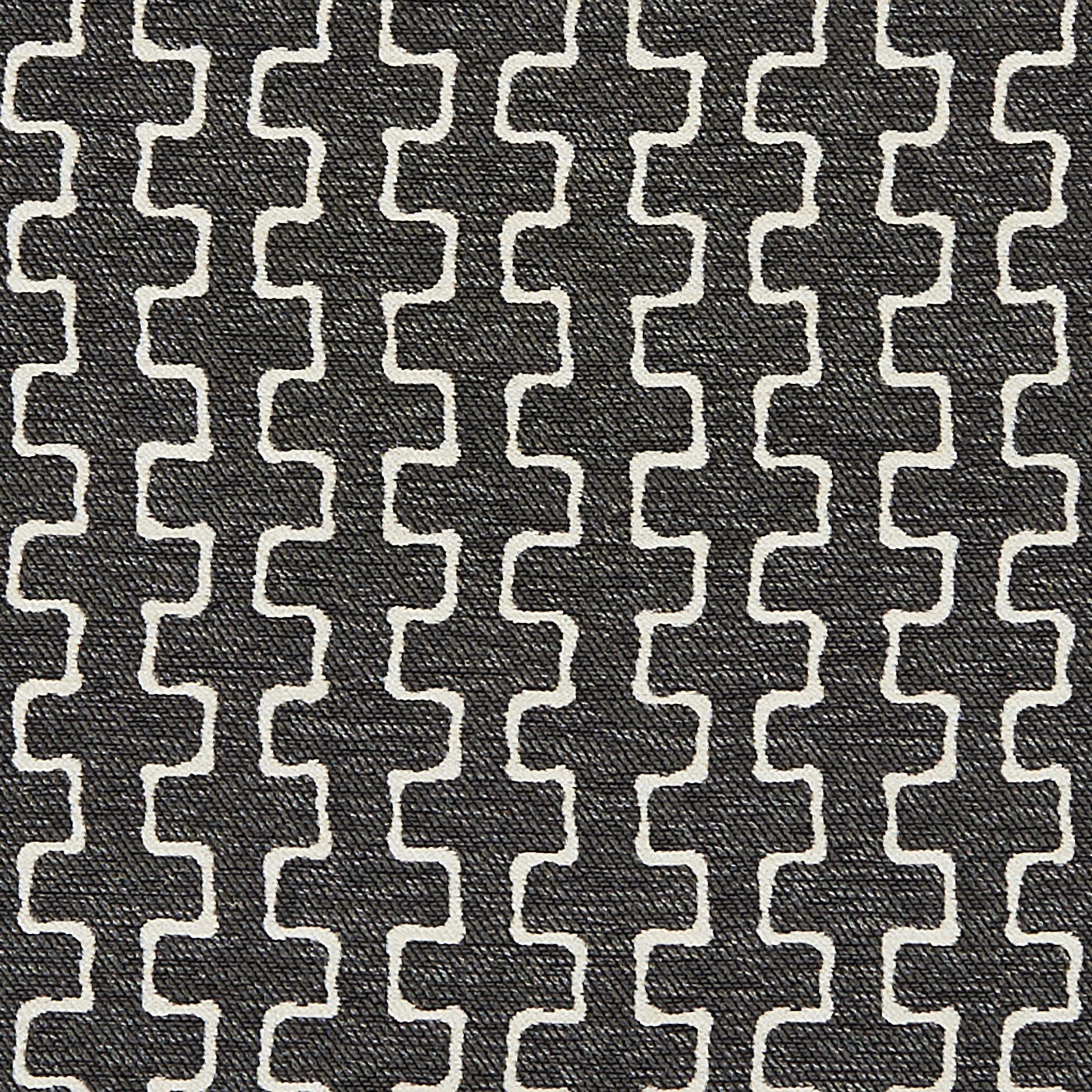 Charcoal fabric with white interlocking S-shaped chain motif, textured woven upholstery.