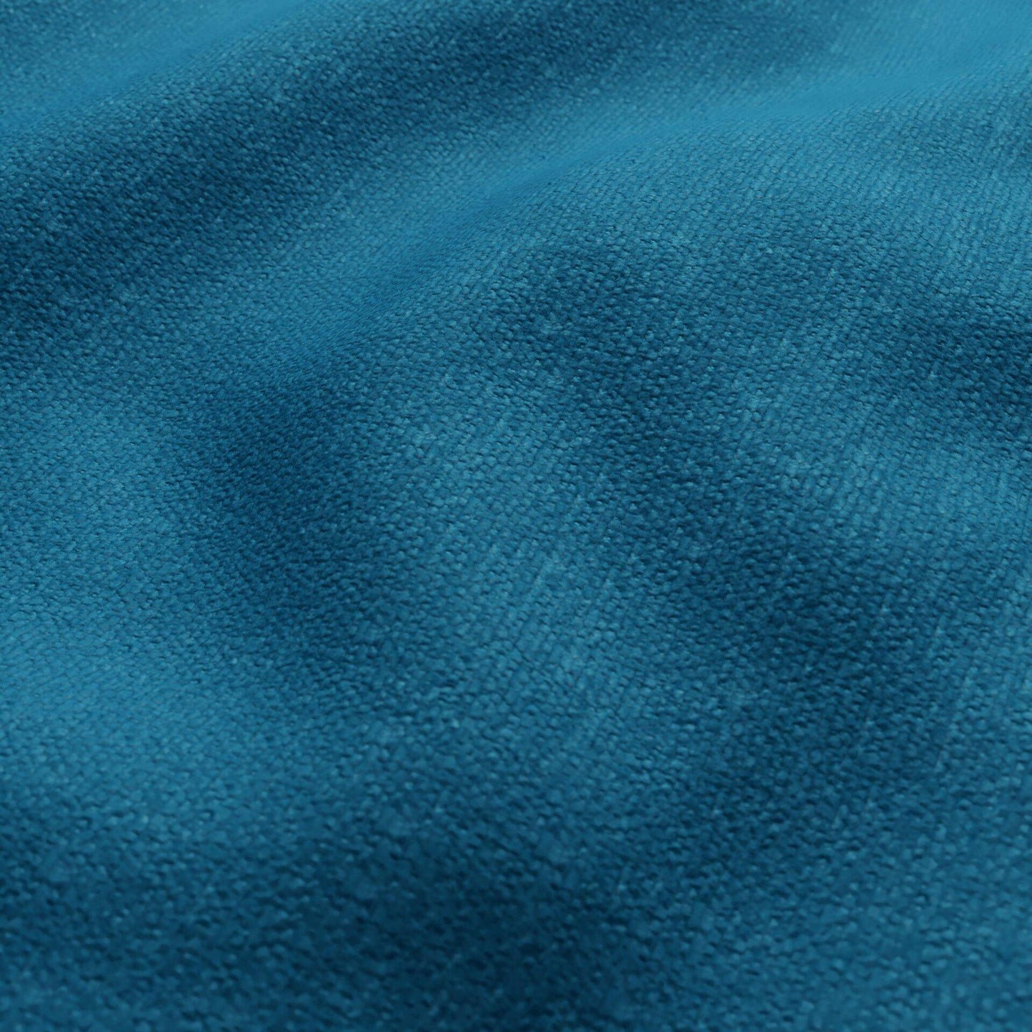 Teal blue chenille outdoor fabric close-up showing texture, nap, and gentle folds.