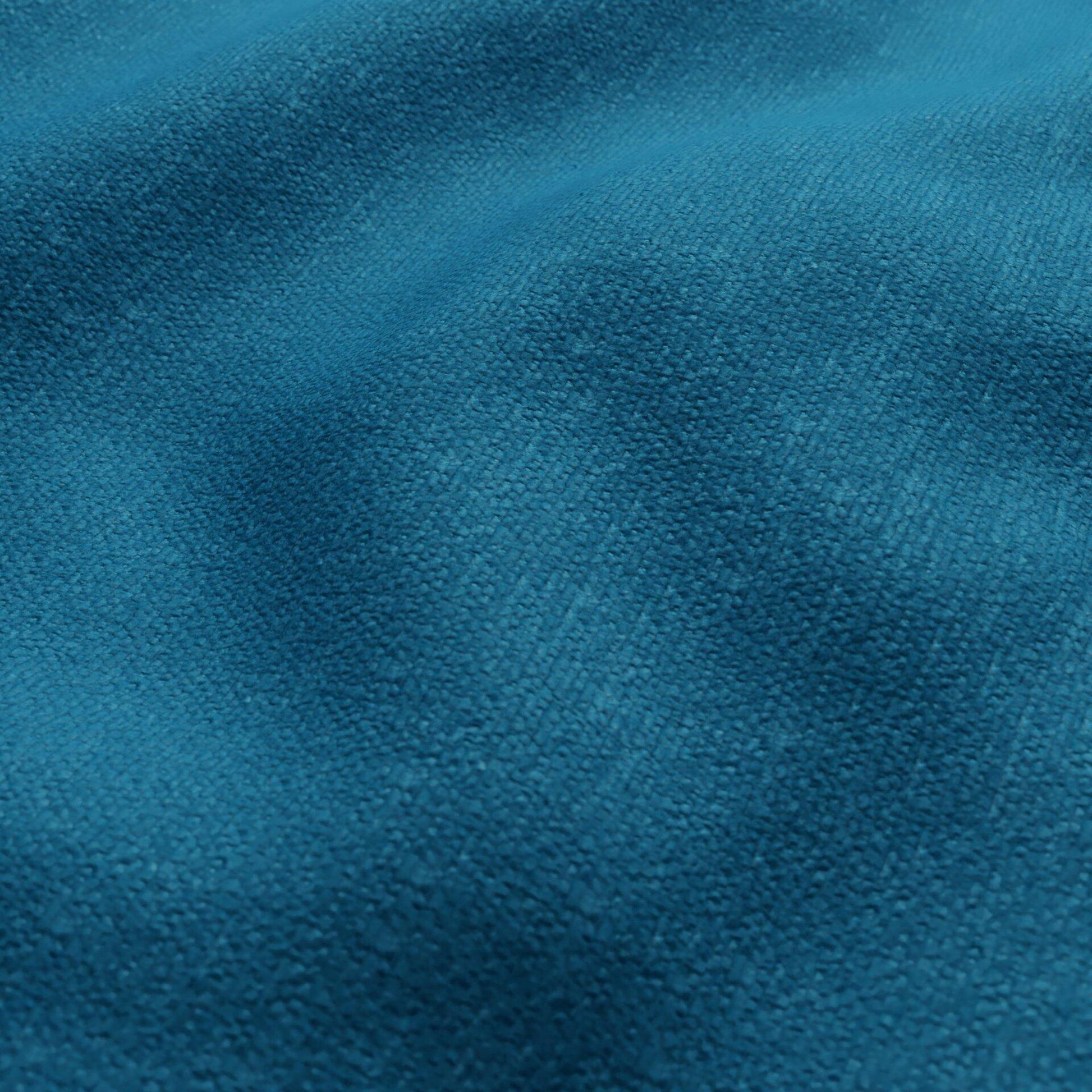 Teal blue chenille outdoor fabric close-up showing texture, nap, and gentle folds.