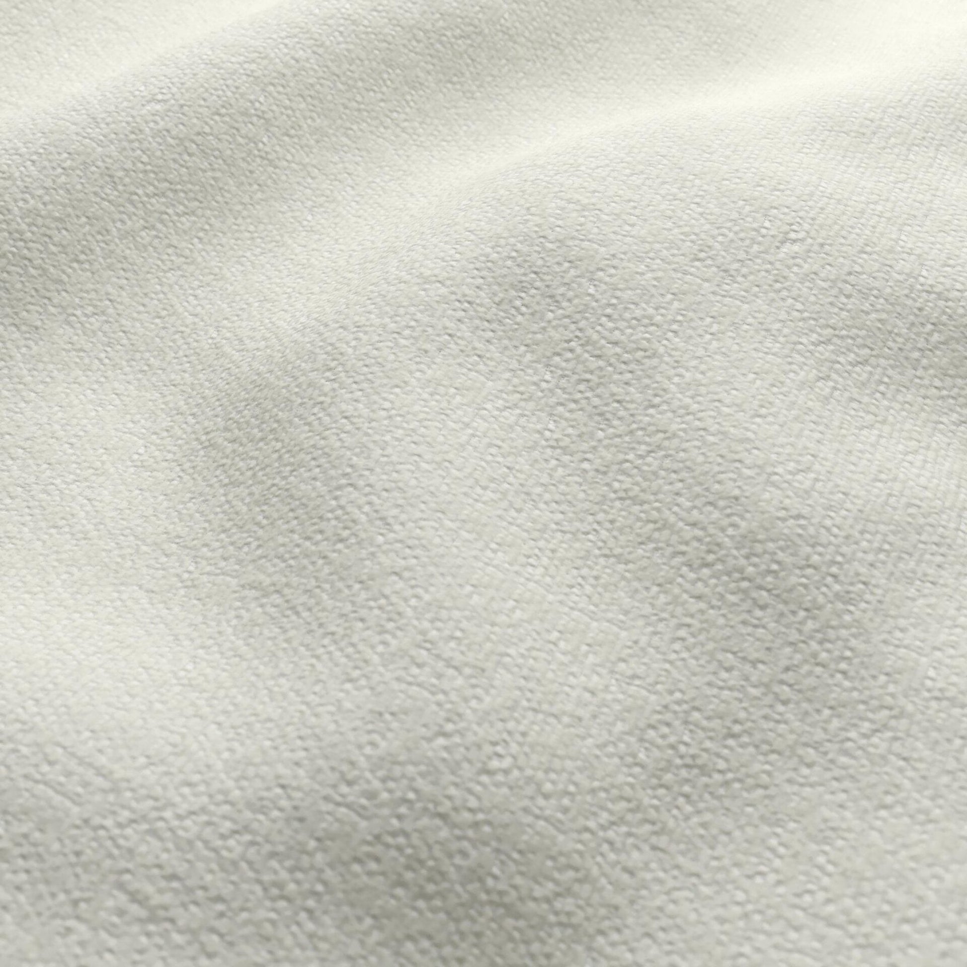 Cream textured chenille fabric close-up with soft terry-like loops; plush outdoor textile.