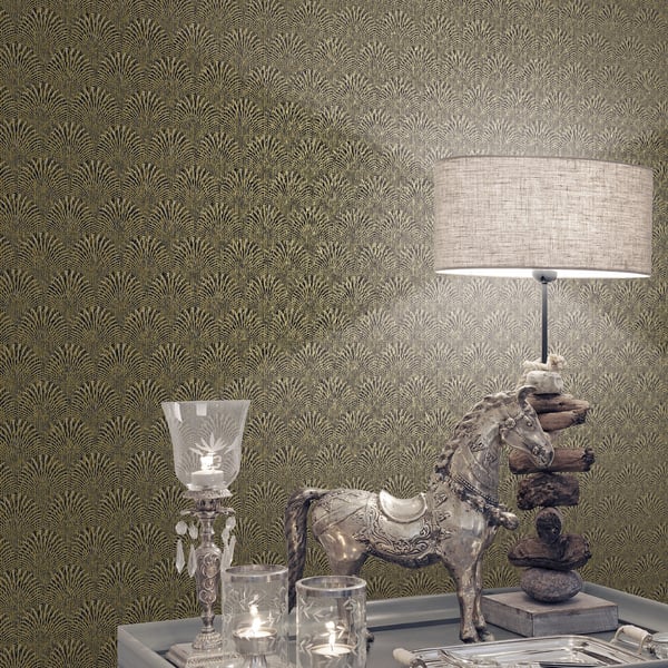 Gold damask wallpaper with a metallic horse statue, glass hurricane candle holder, and stacked-stone lamp with beige shade.