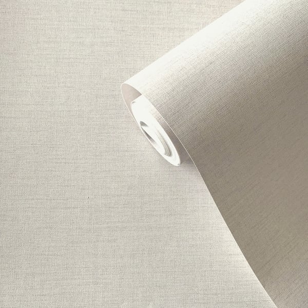 Cream lustre plain wallpaper roll, partially unrolled; smooth, unpatterned wallcovering.