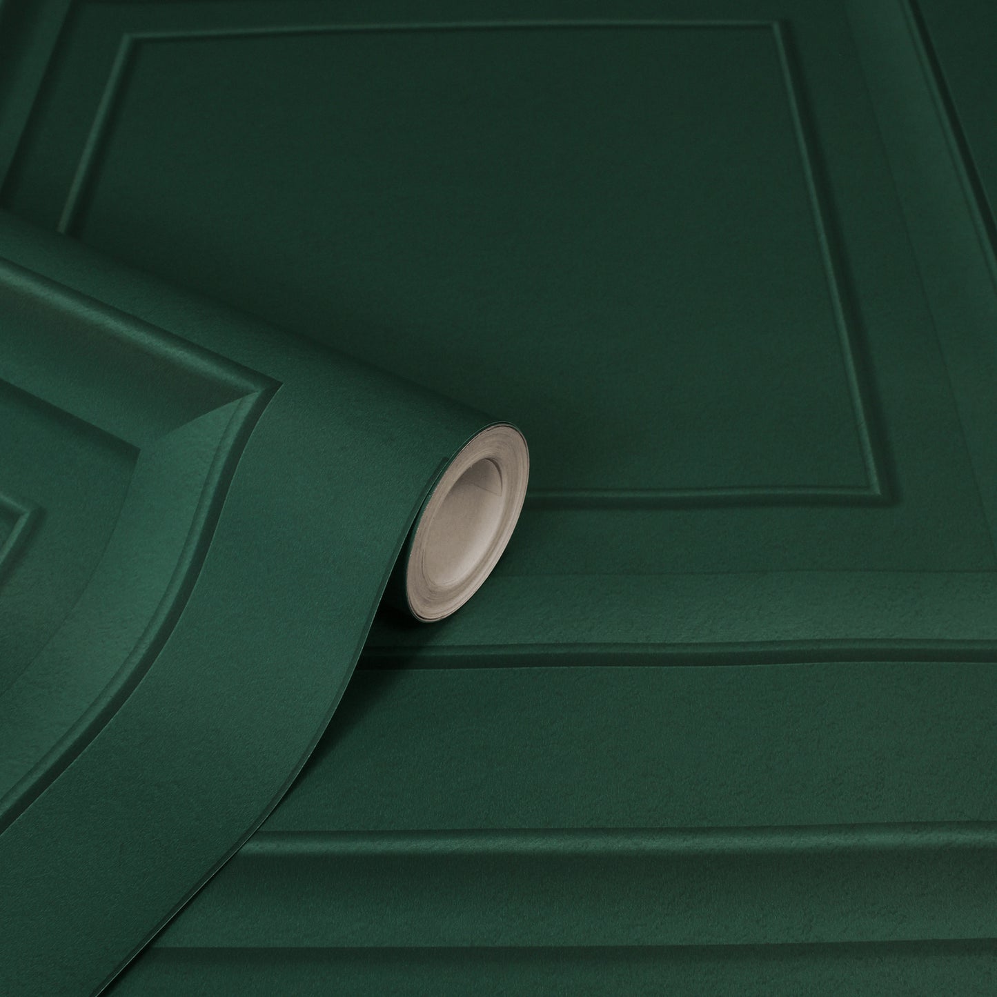 Dark green wallpaper roll with embossed square panel pattern, curling at the edge.