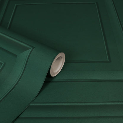 Dark green wallpaper roll with embossed square panel pattern, curling at the edge.
