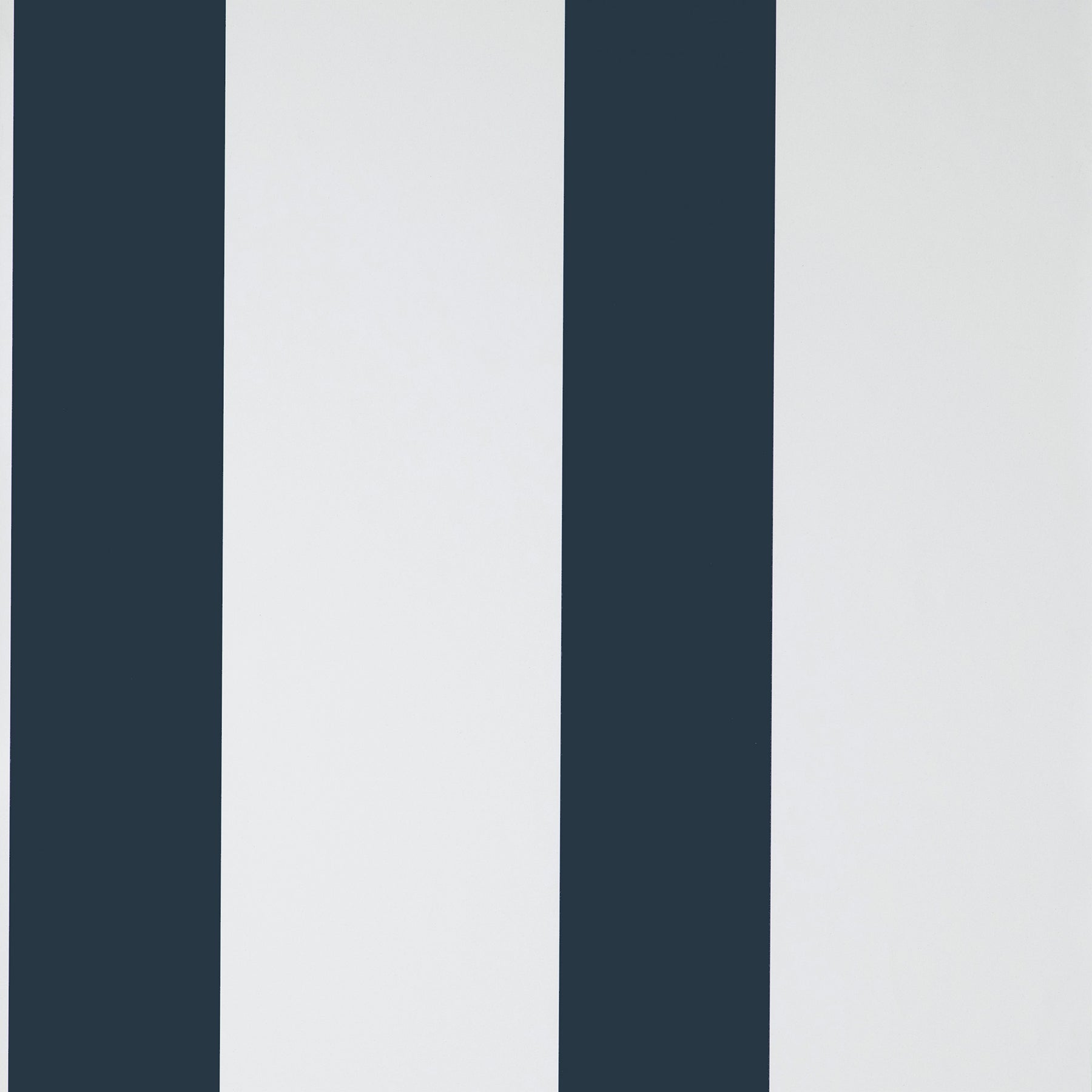 Vertical navy blue and white stripes on wallpaper; bold modern stripe pattern.