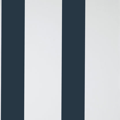 Vertical navy blue and white stripes on wallpaper; bold modern stripe pattern.