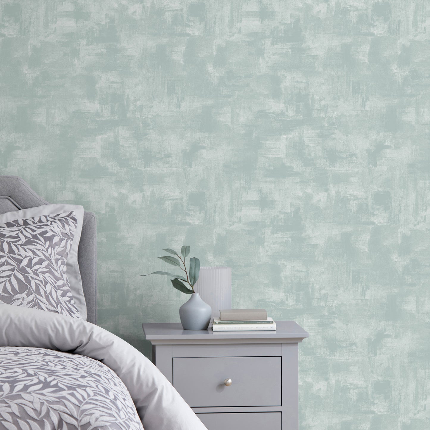 Room with aqua painterly wallpaper featuring modern aqua graphics on the walls.