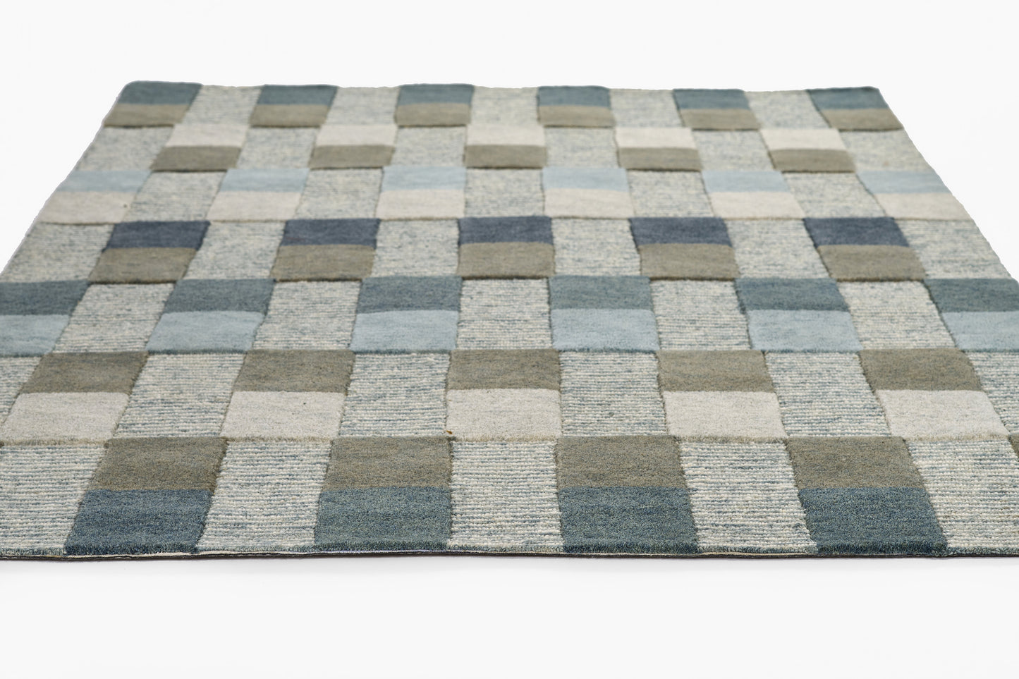 Blue-gray checkerboard flat-weave rug with light and dark squares; modern geometric floor decor.